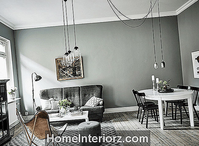 Minimalistiskt grå vardagsrum