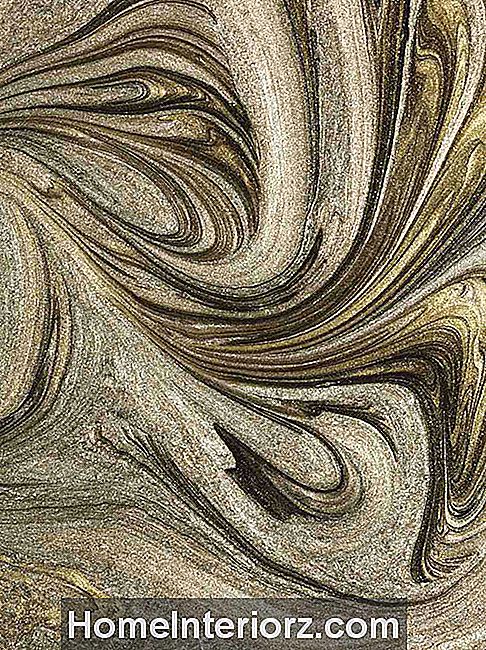 Glitter guld marmorerad färg virvlar mönster